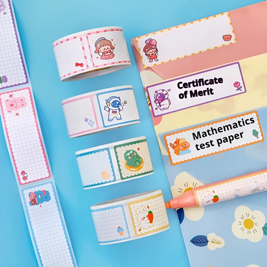 Roll of cartoon-themed adhesive name tape stickers showing dinosaur, astronaut, rabbit, and girl designs.