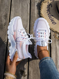 Women's Flyknit mesh lace-up sneakers in grey colour with low rubber sole