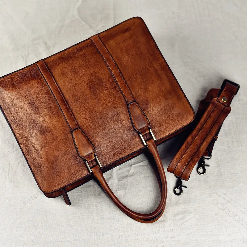 Men's brown leather handbag with horizontal design and zipper opening