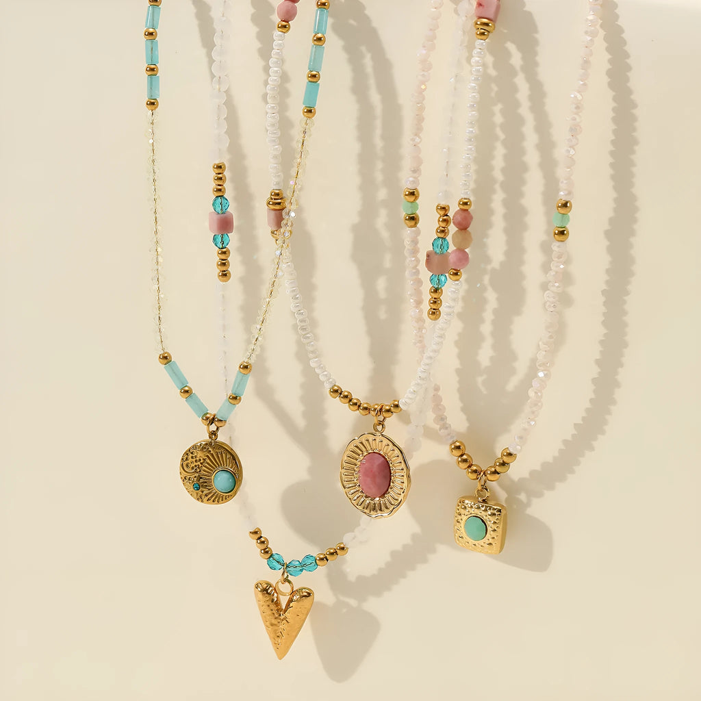 Women's sunflower colour crystal bead necklace with rhodochrosite accents, stainless steel chain, and 18K gold-plated geometry pendant.