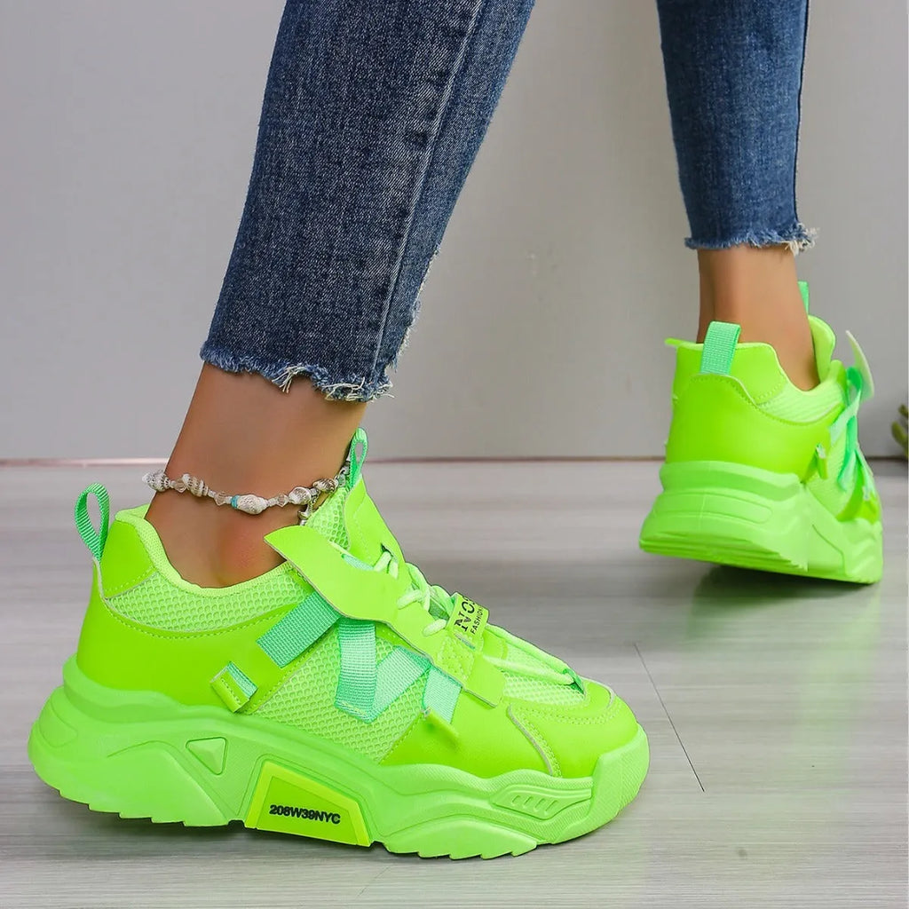 Women's purple platform mesh sports shoes with animal pattern detail and front lace-up closure