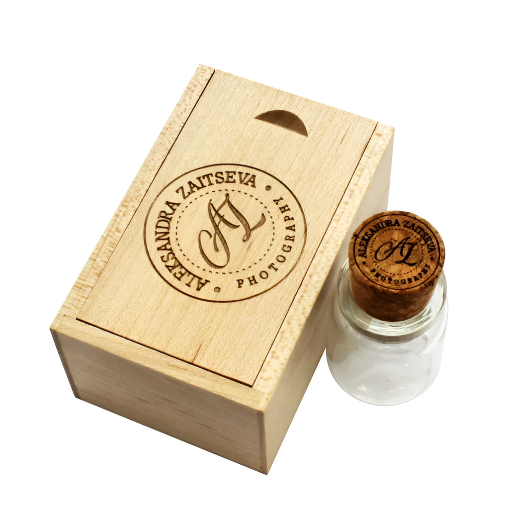 Chocolate brown wooden drift bottle shaped USB flash drive on a wooden surface.