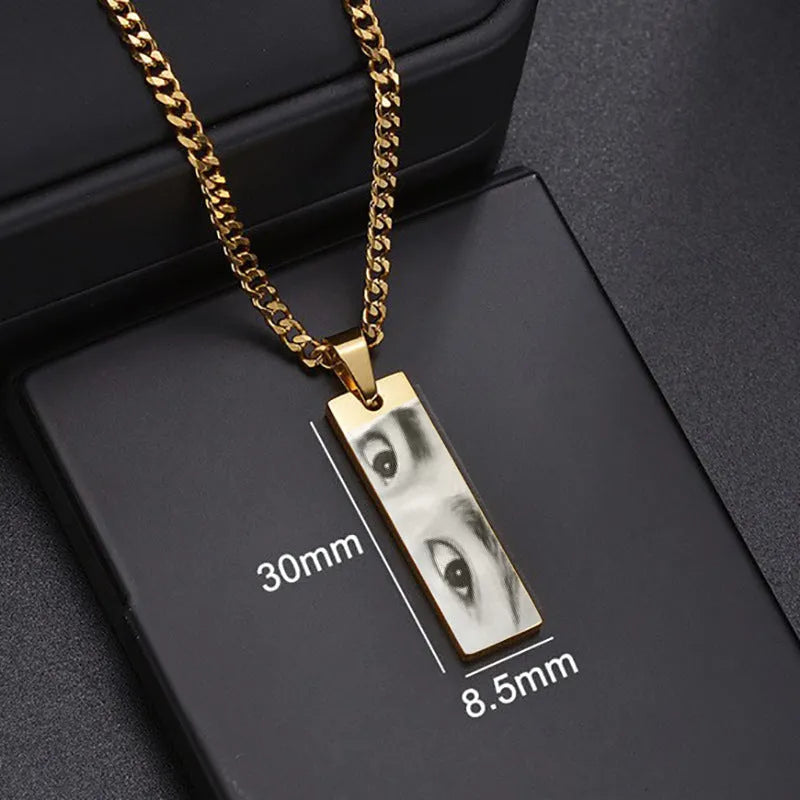 Custom stainless steel photo necklace with engraved eye design, geometric shape, and electroplating finish in a range of colours