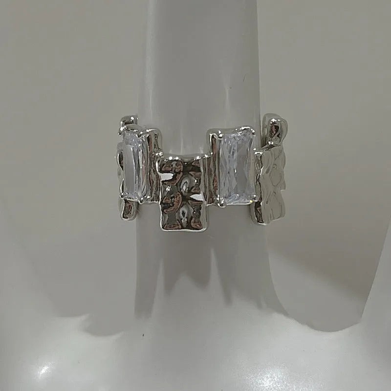 Silver open ring with cross zircon design and geometric retro styling
