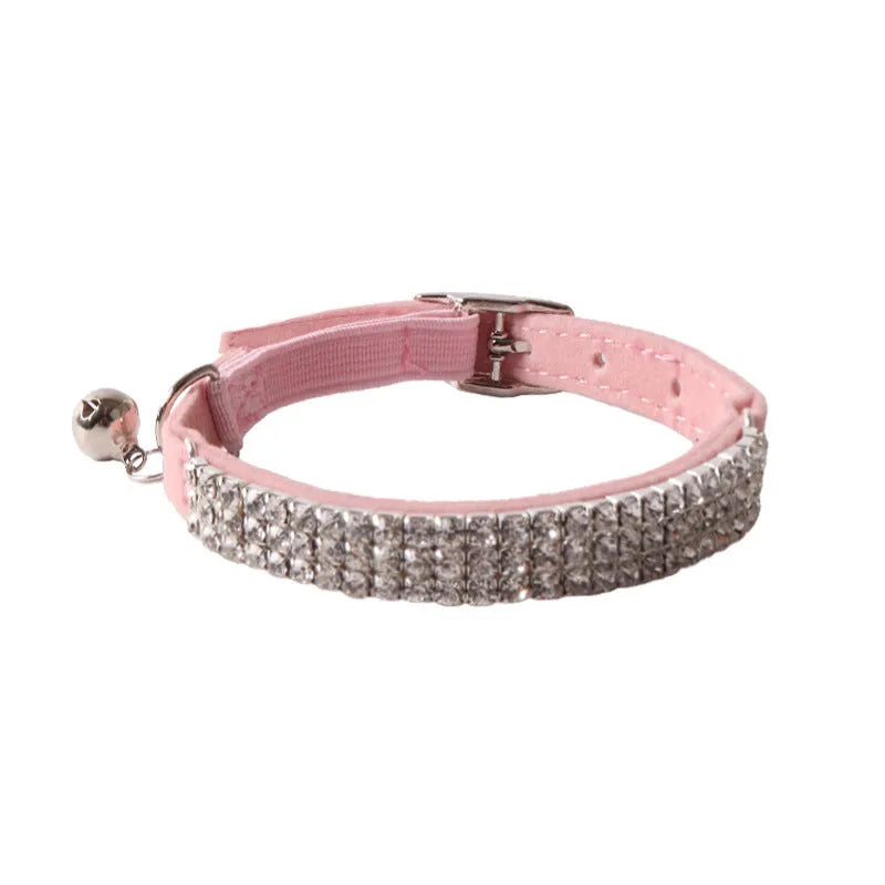 Flocked flannel cat collar with elastic buckle and gang drill pattern in multiple colours.