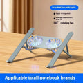 Silver aluminium laptop stand with twin blue LED cooling fans in a folded position next to its cloth carry bag.