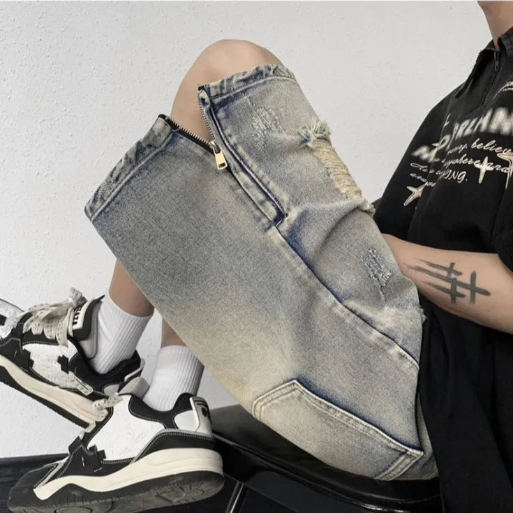 Blue retro-style denim shorts with a loose wide-leg cut and tattered detailing.