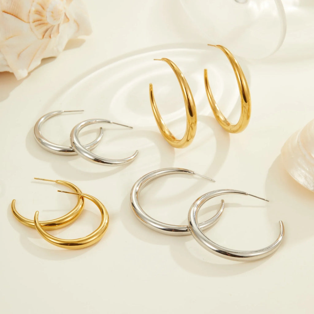 Titanium steel hoop earrings with 18K gold plating in large and small sizes