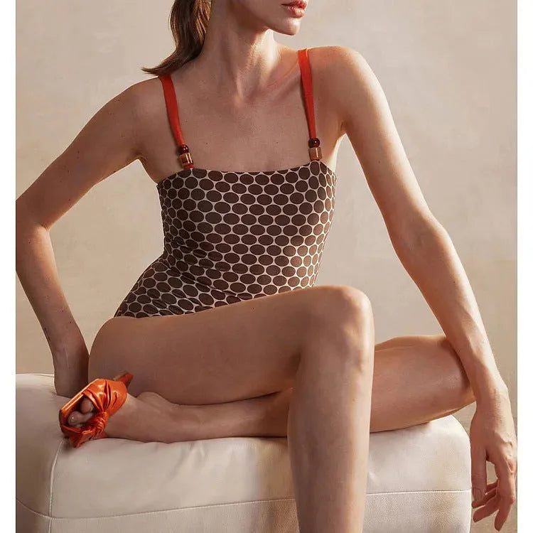 Women's dot print one-piece swimsuit with matching wrap skirt set