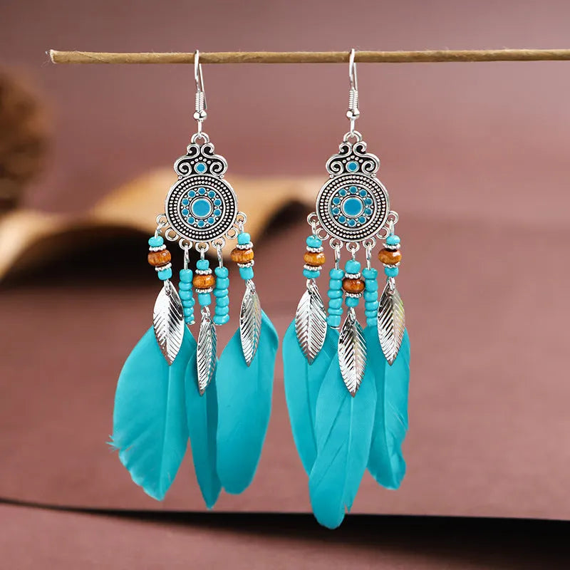Round drop feather earrings with leaf pattern in alloy metal, available in multiple colours