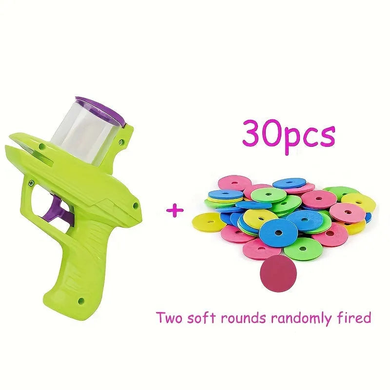 Green and purple manual cat toy launchers with foam discs for interactive indoor pet play