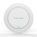 Round white desktop wireless charger with USB cable showing 10W fast charging for mobile phones