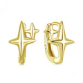 Minimalist star-shaped silver ear clips with an oxidised finish and XINGX design detail.