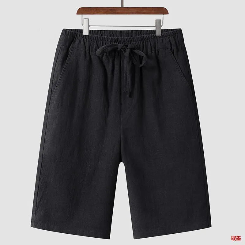 Men's beige linen loose cropped casual shorts on a neutral background.