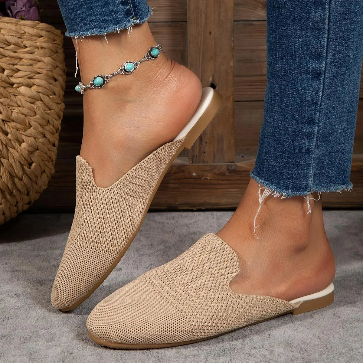 Blue casual mesh sandal with cloth upper and flat rubber sole on a white background.