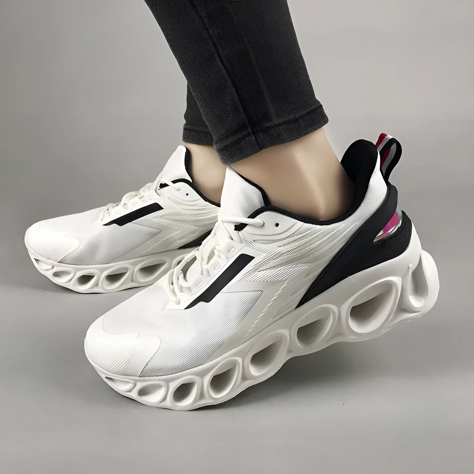 Men's casual mesh sneakers with EVA sole in black colour showing lace-up design and round toe