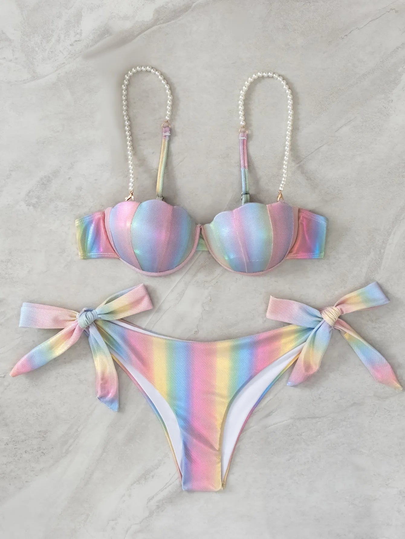 Women's shell rainbow pattern bikini swimsuit with split design and tied back detail