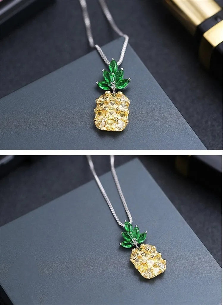 Silver-plated geometric pineapple pendant necklace on model