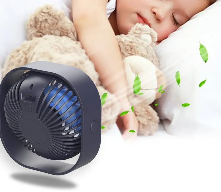 USB-powered desk fan with 360-degree rotation in a modern simple style, shown in blue.