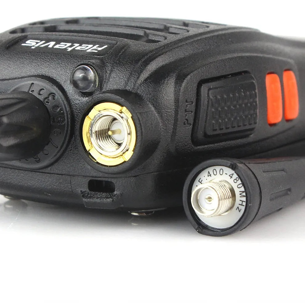 H777 black civil walkie talkie with Li-ion battery and antenna on plain background