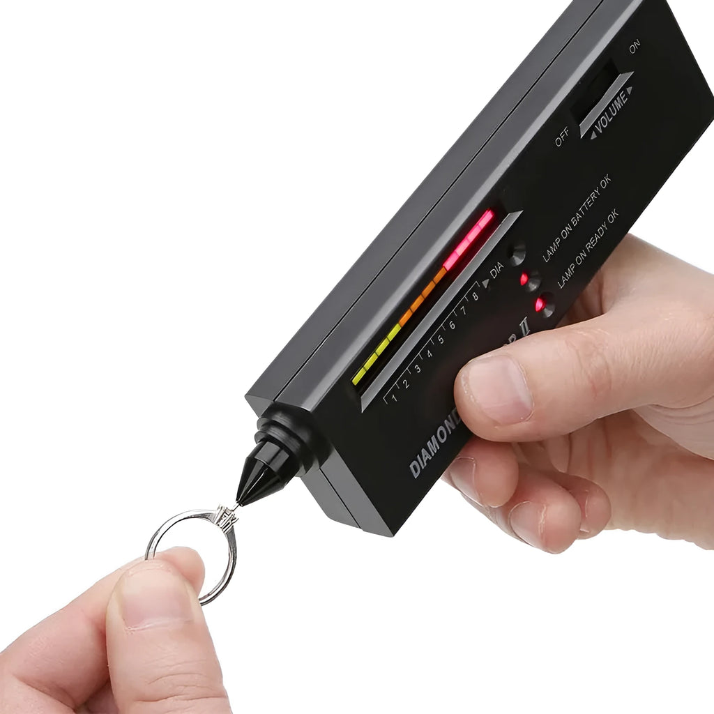Second generation black diamond thermal conductivity tester with metal probe for gem identification.