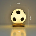 Football LED small night lamp with glass shade, USB plug-in, black and white or wooden frame option