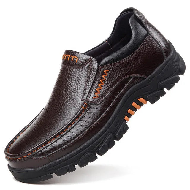 Men's black and brown cowhide leather slip-on business casual shoes with a rubber sole.