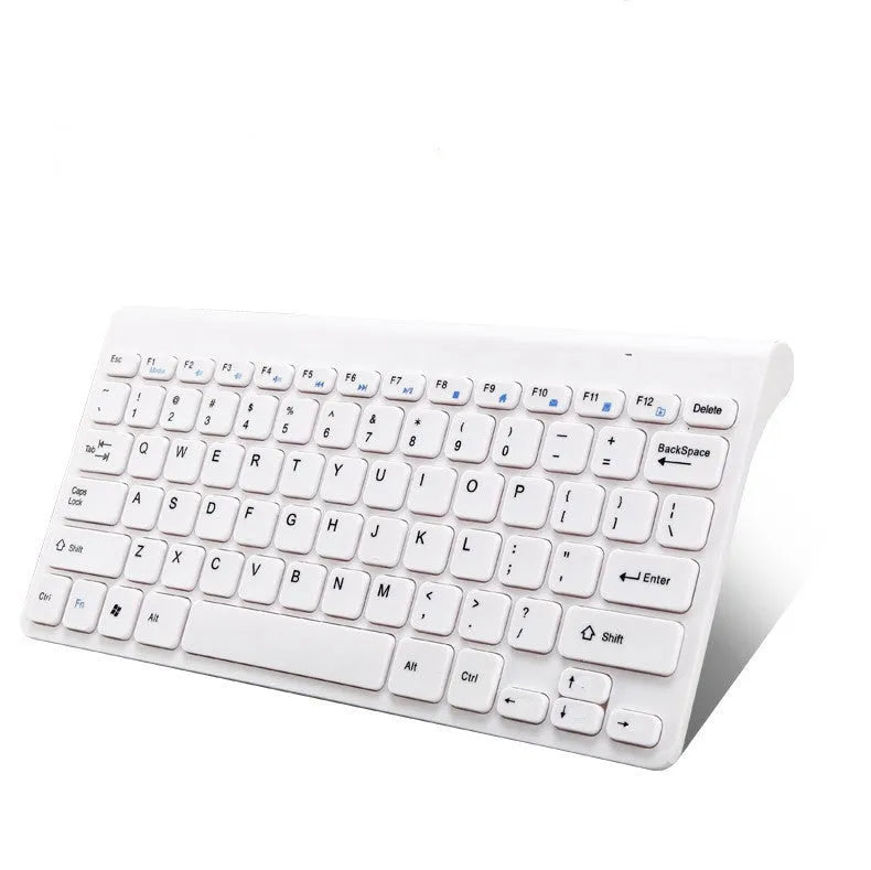 Black wireless keyboard and mouse set with 4G connectivity on desk