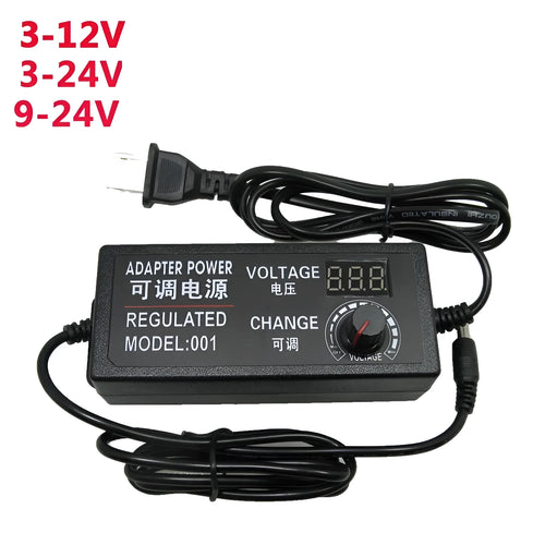 Compact black adjustable power adapter with LED digital display showing voltage output on a white background