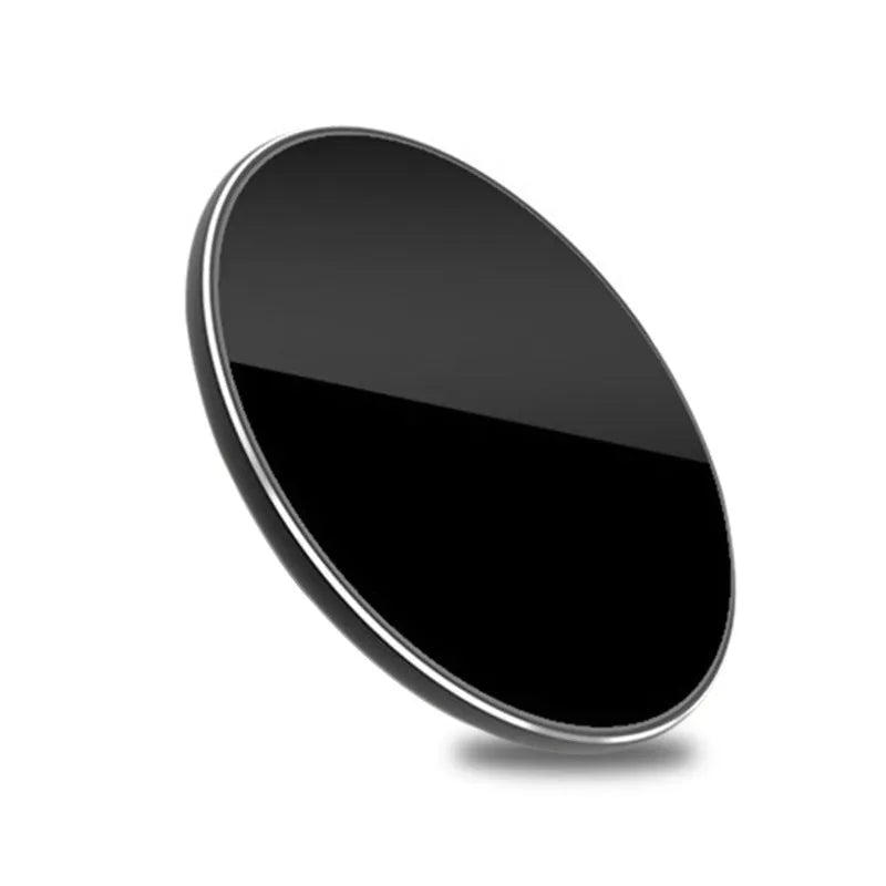 Ultra-thin aluminum wireless charging pad in silver colour on a wooden desk