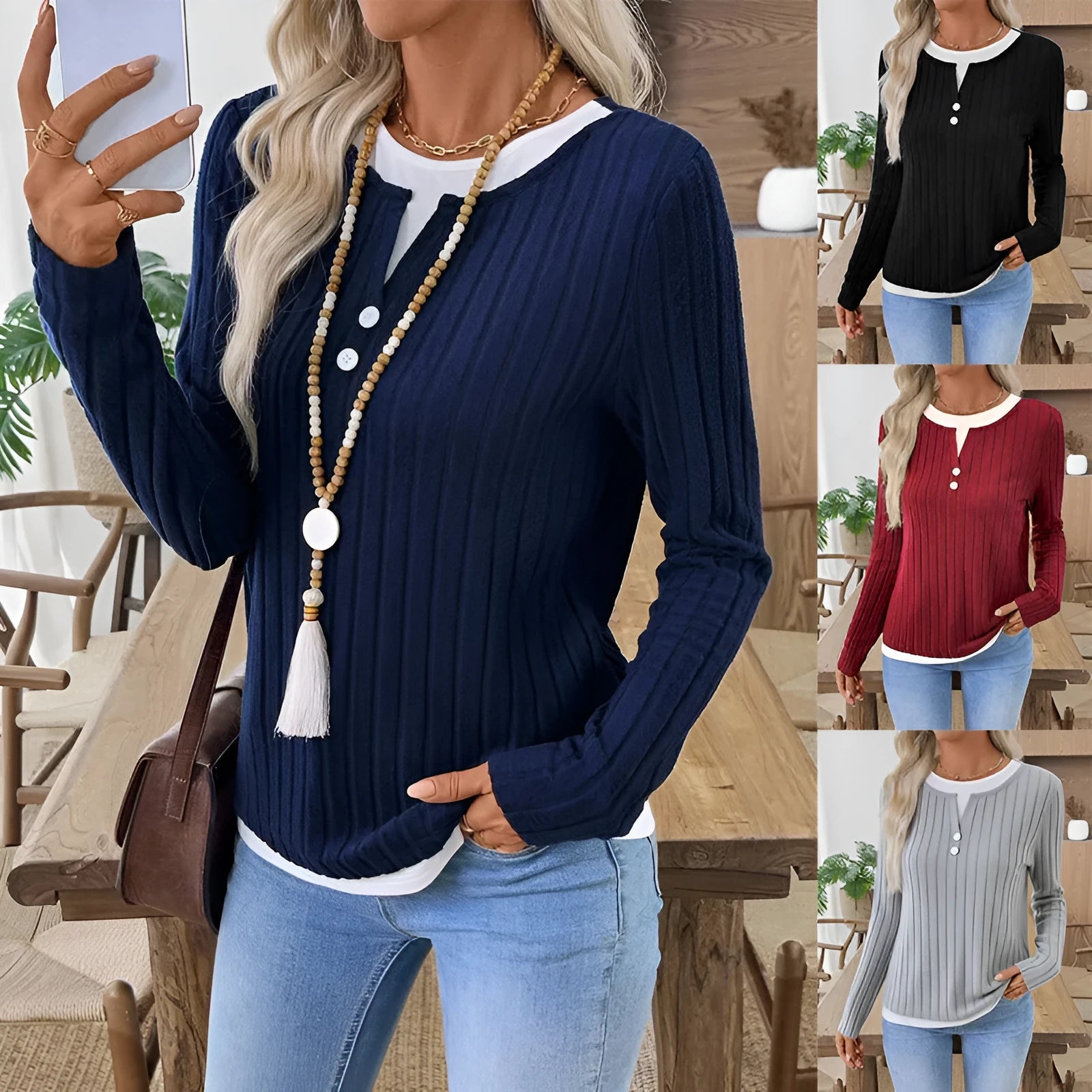 Women's black fake two-piece round neck pullover sweater with concave stripe texture and button details.