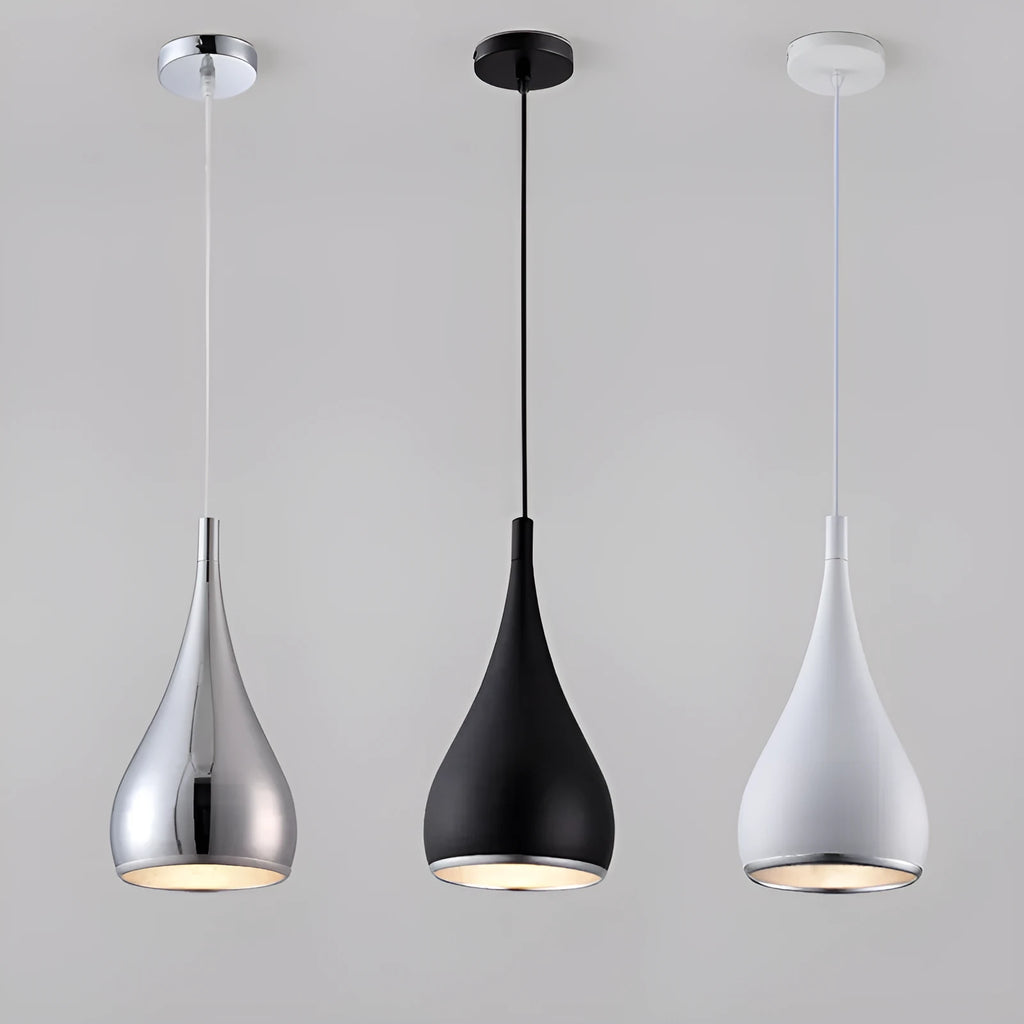 Minimalist iron chandelier in black finish with three bulb heads on a long platter base.