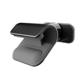 Black universal car phone holder with 360-degree rotation on a car dashboard.