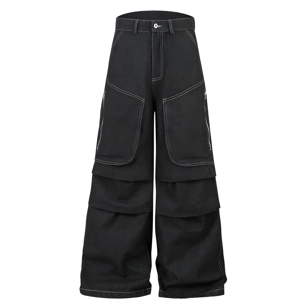 Black pleated denim jeans with multiple pockets, shown on a hanger.