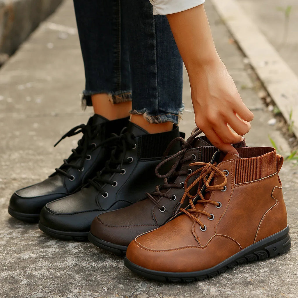 Round toe lace-up ankle boots for women in brown colour with flat non-slip sole and front strap retro western cowboy style