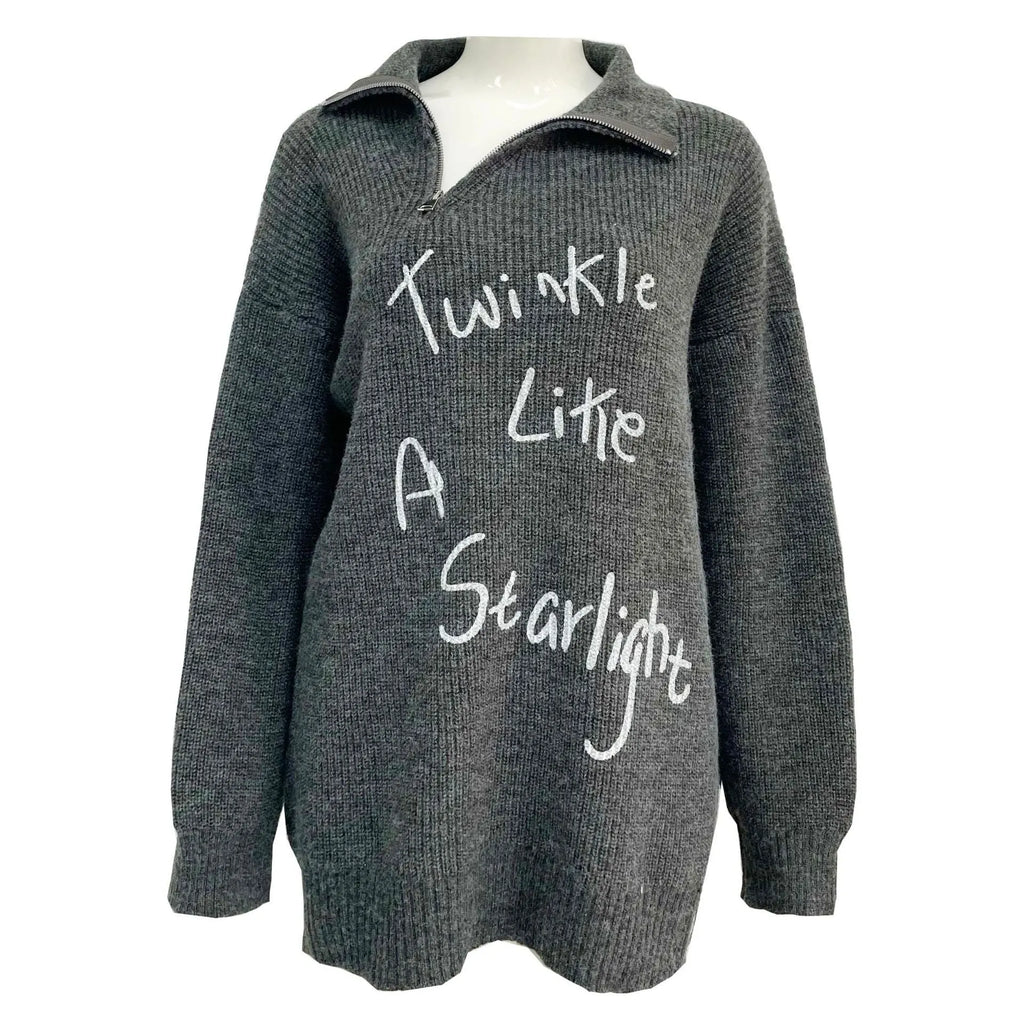 Women's light khaki alpaca fleece pullover sweater with loose lapels and an oblique diagonal zip.