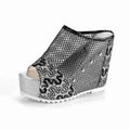 Korean platform flip-flops with hollowed-out heel and chunky waterproof sole in black, gold, and silver.