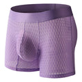 Men's white lace mesh boxer shorts with a geometric knit pattern and low-rise waistband.
