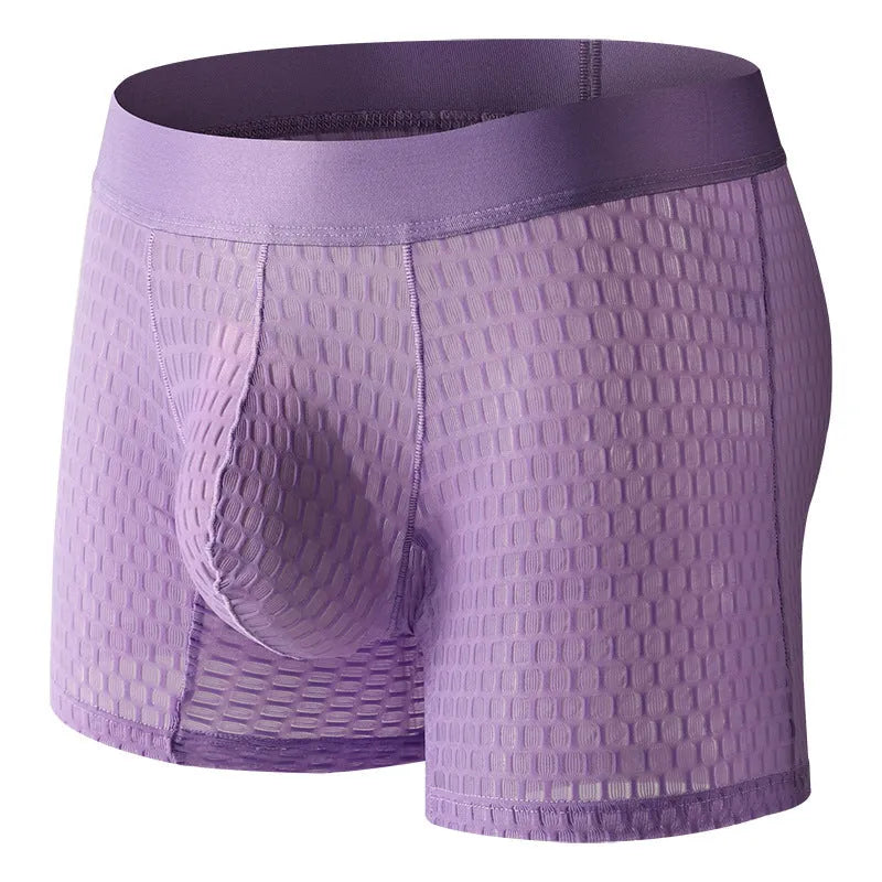 Men's white lace mesh boxer shorts with a geometric knit pattern and low-rise waistband.