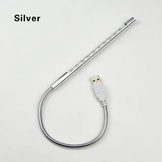 Spiral-shaped aluminium USB desk night light in choice of six colours, showing push button switch.