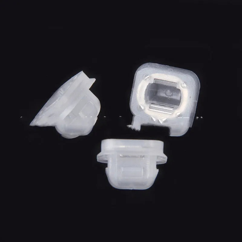 Transparent plastic interior fastener clip for BMW E39 and E38 models showing peach wood design.