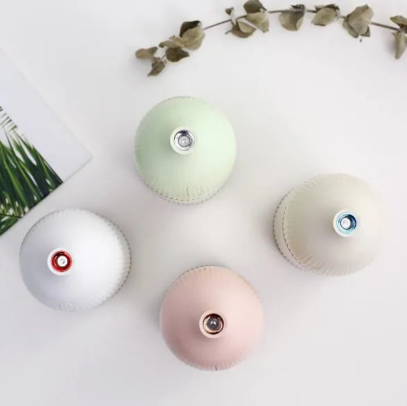 White ultrasonic aromatherapy diffuser and humidifier with LED light, 300ml capacity, 80mm diameter