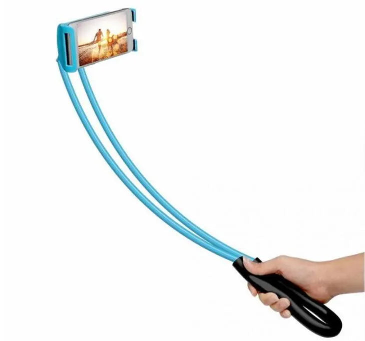 White plastic and foam 360-degree rotatable universal phone holder on a table.