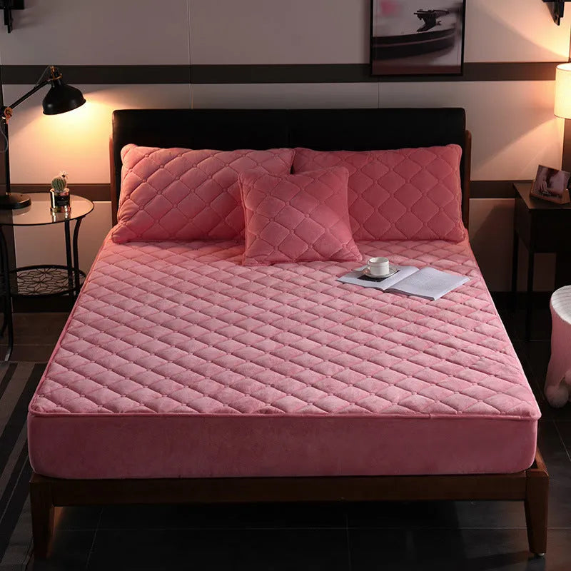 Crystal fleece padded bed cover in grey with quilted stitching and matching pillow case