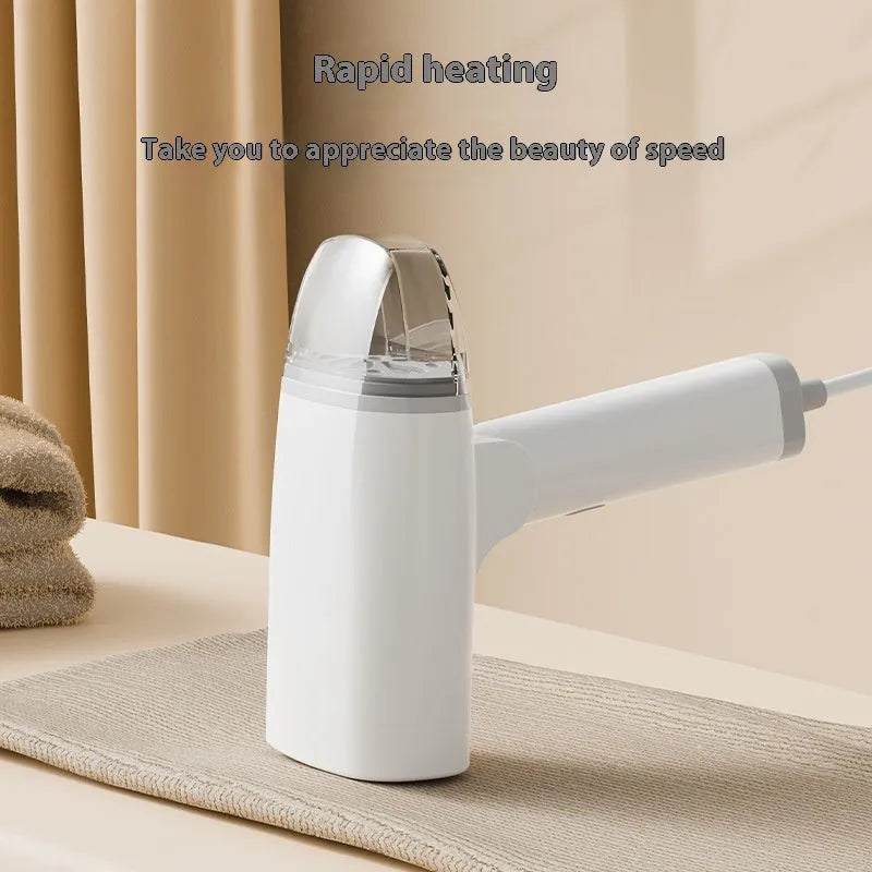 HB-668 handheld garment steamer in white or blue with mechanical controls and water tank