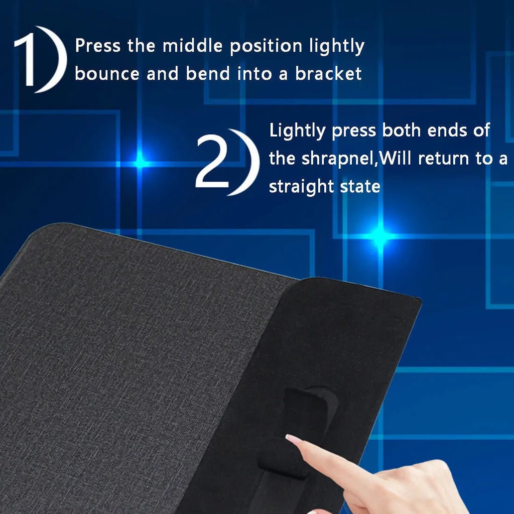 Black 2-in-1 wireless charging mouse pad with non-slip base and phone stand on a desk