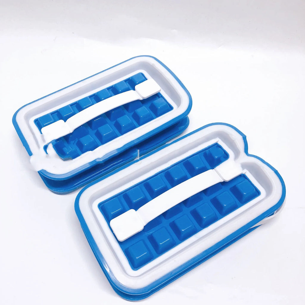 Blue silicone ice cube tray with 36 grids on a white background showing lid and one removed cube