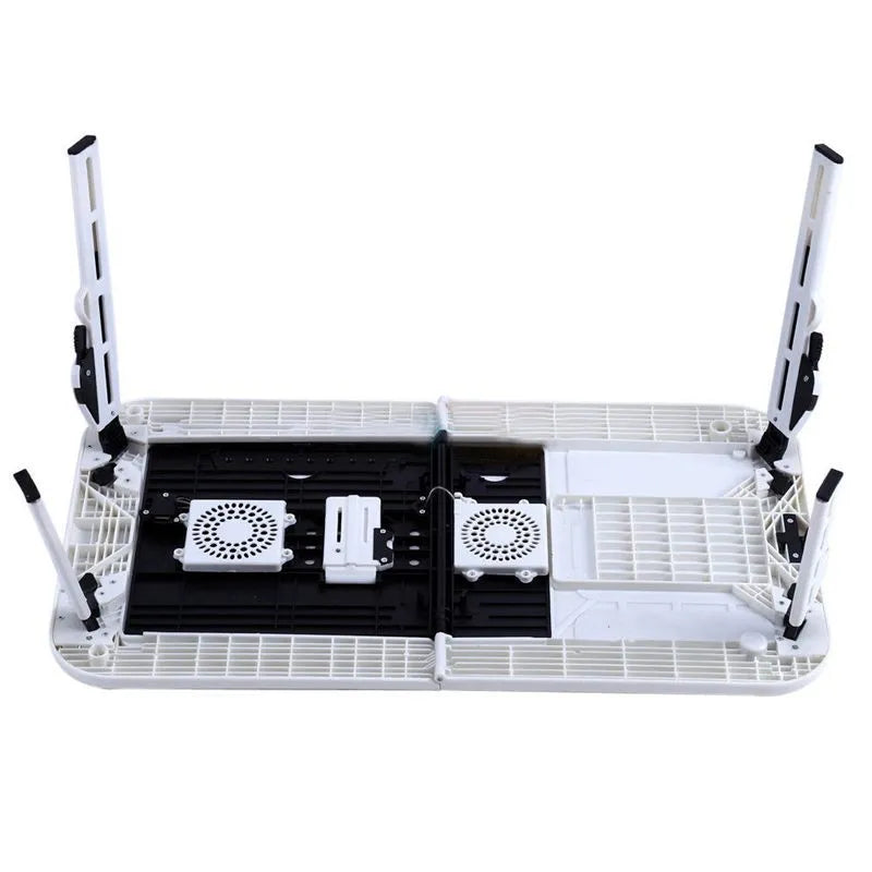 White folding ABS laptop desk with adjustable legs tilting baseplate on bed, folded size 285x316x36mm