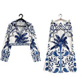 Women's floral print casual co-ord set with long sleeve top and long skirt on a hanger.