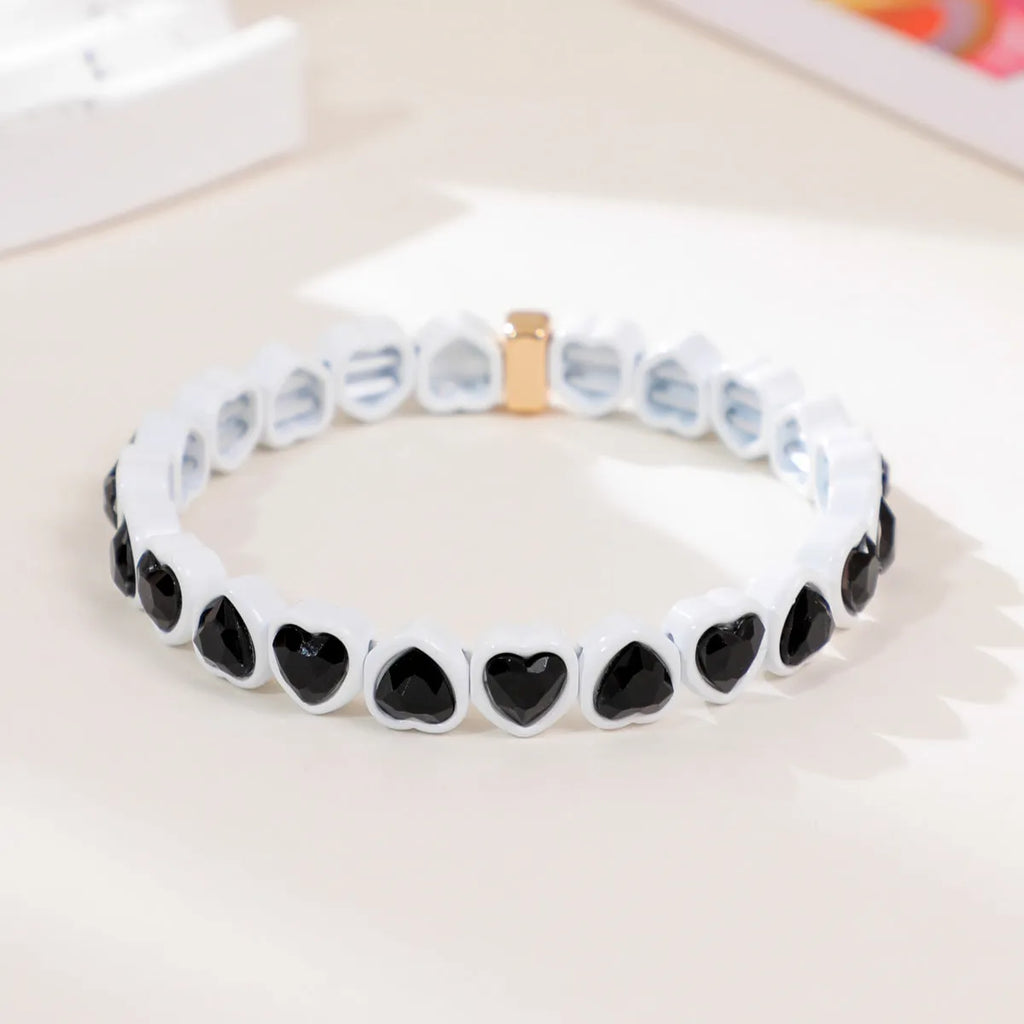 Rainbow enamel heart bracelet in alloy with colourful stretch band and unisex styling